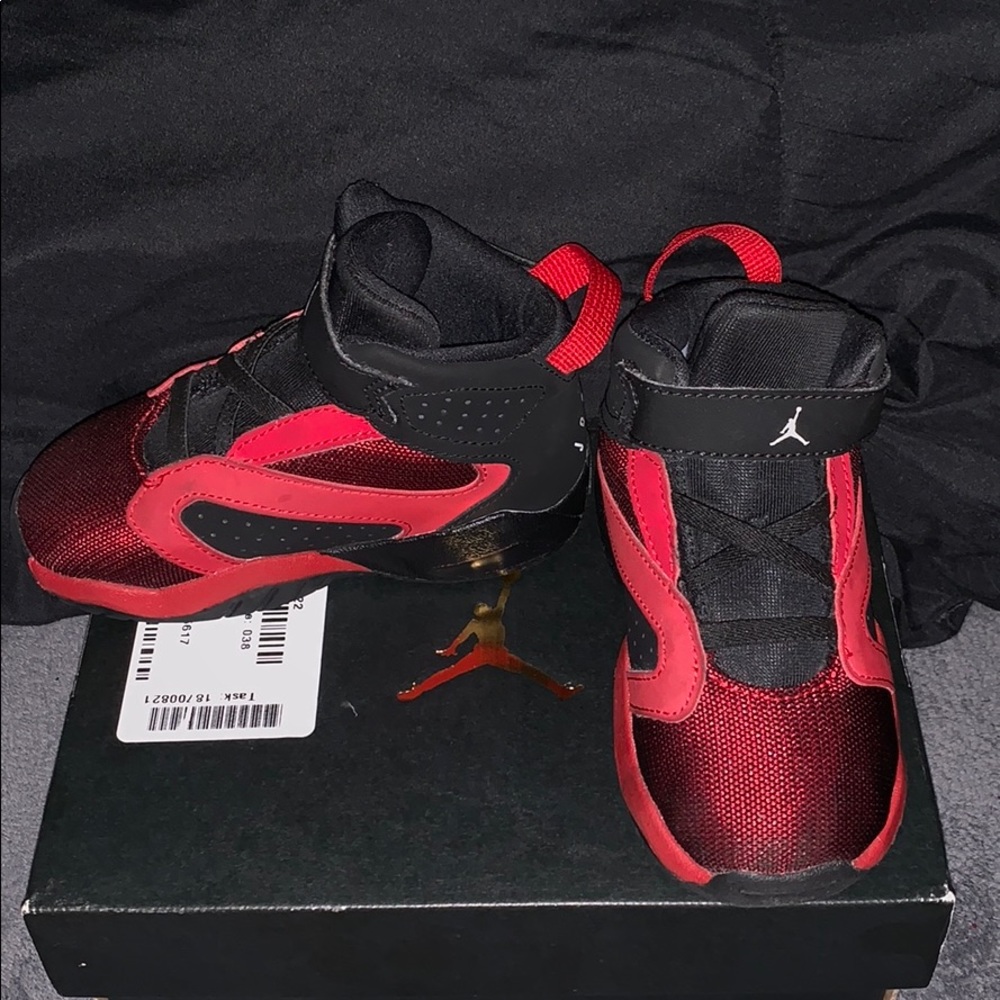 Size 7 toddler Red and Black Jordans